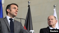Presidenti francez Emmanuel Macron (majtas), dhe kancelari gjerman Olaf Scholz. (Fotografi nga arkivi)