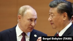 Президент РФ Владимир Путин (слева) и Председатель Китайской Народной Республики Си Цзиньпин, 16 сентября 2022 года