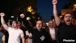 Armenia - Opposition members and supporters led by deputy parliament speaker Ishkhan Saghatelian (center) march through Yerevan, April 25, 2022. 
