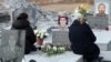 Armenia - Women visit one of the graves of Armenian soldiers killed in the 2020 war in Nagorno-Karabakh and buried in the Yerablur Military Pantheon in Yerevan, January 28, 2022.