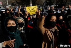 Afghan women protested against the closure of universities to women by the Taliban in Kabul on December 22.