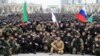 Рамзан Кадыров во время смотра сил военных подразделений на территории собственной резиденции 24 февраля 2022 года 