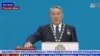 Қазақстан президенті Нұрсұлтан Назарбаев ұлықтау салтанатында қолын конституцияға қойып ант қабылдап тұр. Астана, 29 сәуір 2015 жыл. 24.kz арнасынан скриншот.