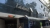 Karzai Calls Kabul Bank 'Safe' Amid Signs Of Panic