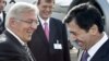 German Foreign Minister Frank-Walter Steinmeier (L) is welcomed by his Uzbek counterpart Vladimir No