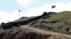 ARMENIA -- Azerbaijani (L) and Armenian army posts at the Sotk gold mine on the Armenian-Azerbaijani border, June 18, 2021