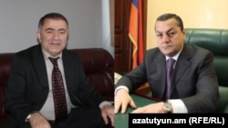 Armenia -- Parliament deputies Arayik Grigorian (R) and Murad Muradian.
