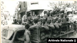 Soldați sovietici pe una din străzile Bucureștiului, în prima zi a ocupației, 30 august 1944. Arhivele Naționale, prin Institutul de Istorie care a funcționat pe lângă Comitetul Central al Partidului Muncitoresc Român, primul nume al partidului unic specific dictaturii comuniste.