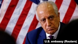 The U.S. special envoy for peace in Afghanistan, Zalmay Khalilzad, talks with local reporters at the U.S. Embassy in Kabul in November.