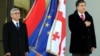 Georgia -- President Mikheil Saakashvili (R) and his visiting Armenian counterpart Serzh Sarkisian attend an official welcome ceremony in Tbilisi, 29Nov2011