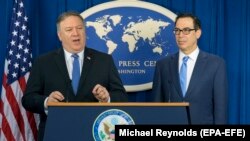 U.S. -- U.S. Secretary of State Mike Pompeo (L) and U.S. Treasury Secretary Steven Mnuchin announce sanctions against Iran during a news conference at the Foreign Press Center in Washington, November 5, 2018