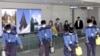 Health officials disinfect the passenger terminal at Incheon International Airport in Seoul on May 3, 2009