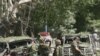 NATO soldiers secure the site of the attack on August 15