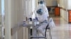 Medical workers at the Surp Grigor Lusarovich Medical Center in Yerevan, the country's largest hospital treating coronavirus patients (archive photo)