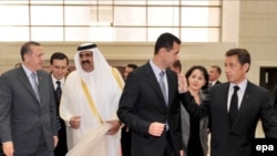 Prime Minister Recep Tayyip Erdogan (left) seems intent on increasing Turkey's influence with such neighbors as Syria's President Bashar Assad (2nd right).