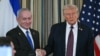 TOPSHOT - US President Donald Trump and Israeli Prime Minister Benjamin Netanyahu shake hands at the conclusion of a joint press conference in the State Dining Room of the White House in Washington, DC on September 29, 2025.