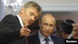 Дзьмітры Пяскоў і Ўладзімер Пуцін