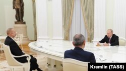 RUSSIA -- Russian President Vladimir Putin meets with Azerbaijani President Ilham Aliyev and Armenian Prime Minister Nikol Pashinian in the Krelmin, January 11, 2021.