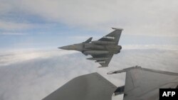 Një avion luftarak francez, Dassault Rafale B, në një vendndodhje të paspecifikuar në hapësirën ajrore polake gjatë një stërvitjeje si pjesë e operacionit të NATO-s "Roja Lindore", 13 shtator.