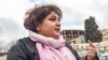 Azerbaijan -- Baku. RFERL journalist Khadija Ismayil and her lawyer Elton Guliyev 
