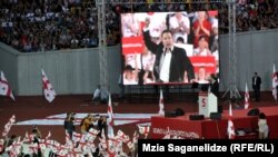 Автоколонны из разных регионов привезли в Тбилиси сторонников "Нацдвижения"