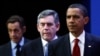 U.S. President Barack Obama (right), British Prime Minister Gordon Brown (center), and French President Nicolas Sarkozy gather to condemn Iran after Tehran revealed it is secretly building a second uranium-enrichment facility.